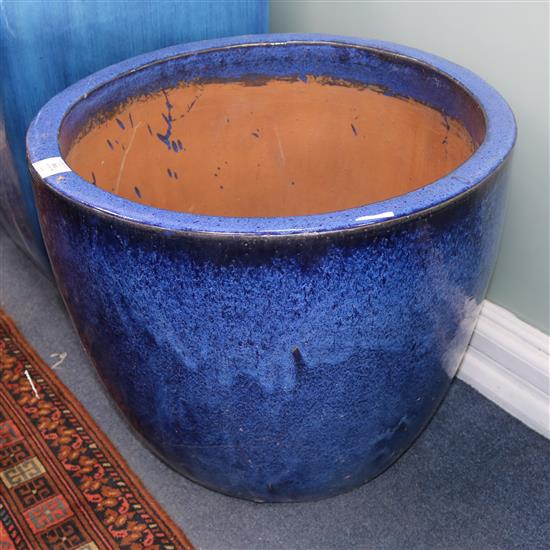 A blue glazed pottery garden urn, Diameter 58cm